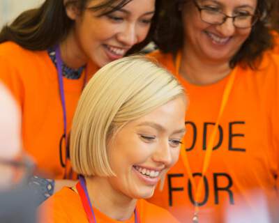 group of 3 women smiling