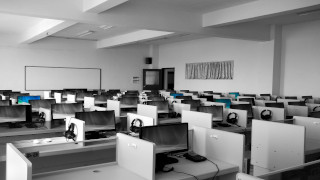 empty office with computers on desks